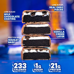 Grenade Vanilla Oreo bar cross-section reveals protein nougat and Oreo pieces.