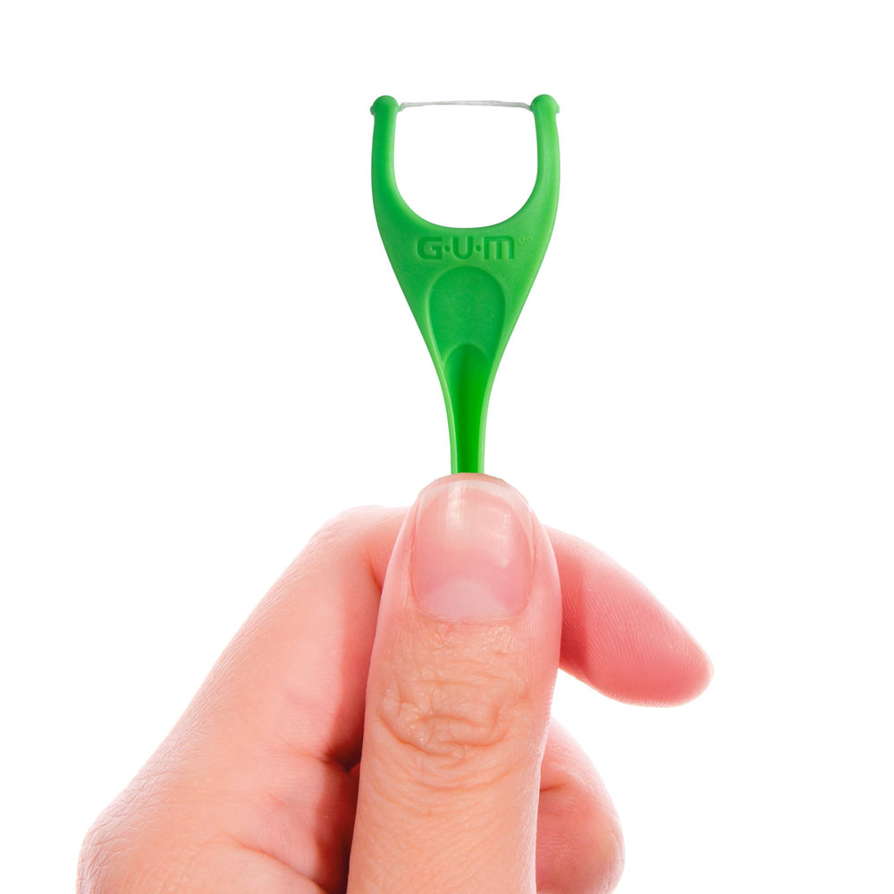 Adult-use floss picks in hand