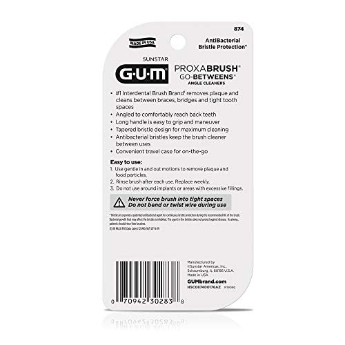 Reusable floss brush with protective travel cap for between-teeth cleaning