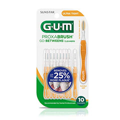 Interdental brush inserted between teeth showing plaque removal