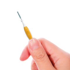Brush with travel cap and hygienic coating for up to ten days of use