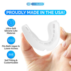 Front view of GumGuard set with dentures