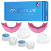 GumGuard denture mouthguard set for upper and lower arches in pink packaging.