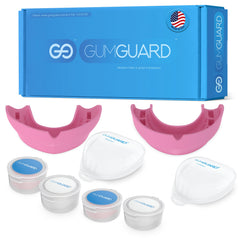 GumGuard denture mouthguard set for upper and lower arches in pink packaging.