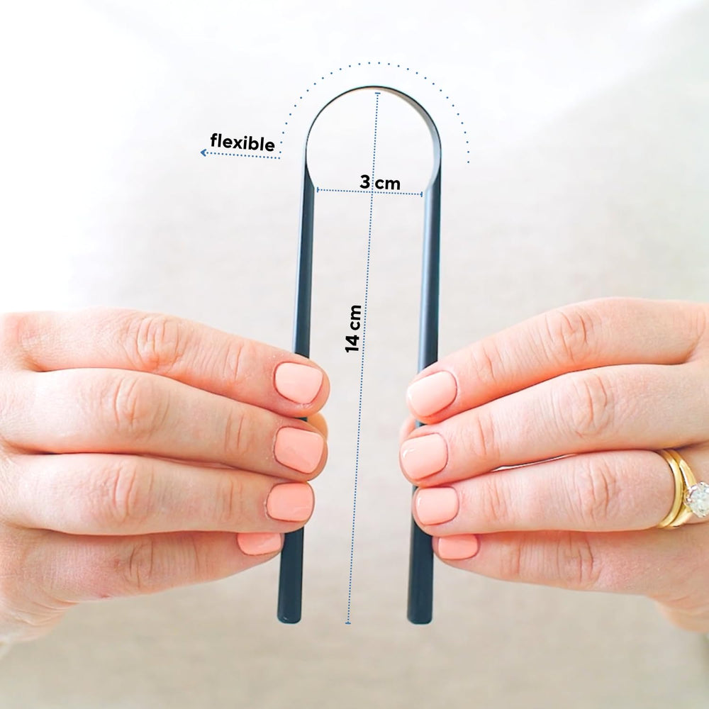 Person using Gunkii Tongue Scraper for oral hygiene