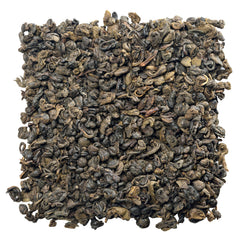 Close-up of rolled gunpowder green tea leaves