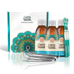 Three GuruNanda oil pulling mouthwash bottles in a 3-pack display