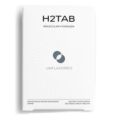 H2TAB hydrogen tablet dissolving in water for quick hydration.