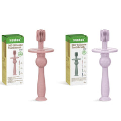 Haakaa 360° Baby Toothbrush with suction base in blush color