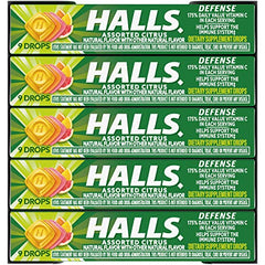 HALLS Defense Assorted Citrus vitamin C drops on a table