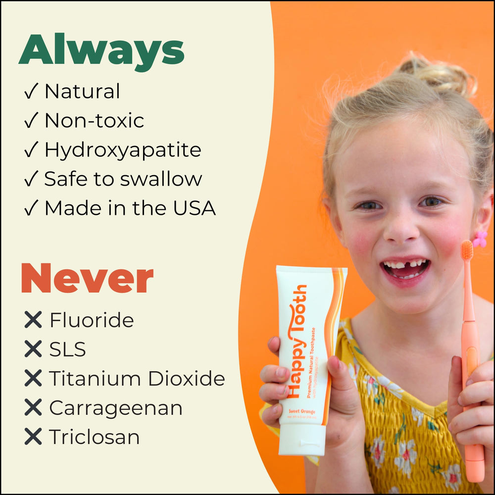 Close-up of Happy Tooth toothpaste tube
