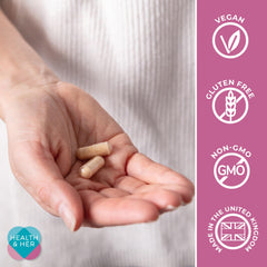 Assorted vitamins and minerals arranged on white background