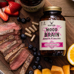Non-GMO and allergen-free badge on HEART & SOIL Brain Supplement packaging