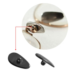 Close-up of screw-in nose pad with screws