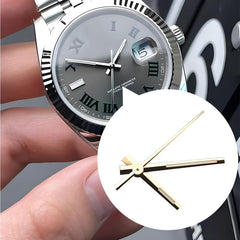 Hour, minute and center second hands in gold finish