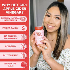 Hey Girl Nutrition ACV capsules pouring from bottle for quick daily intake.