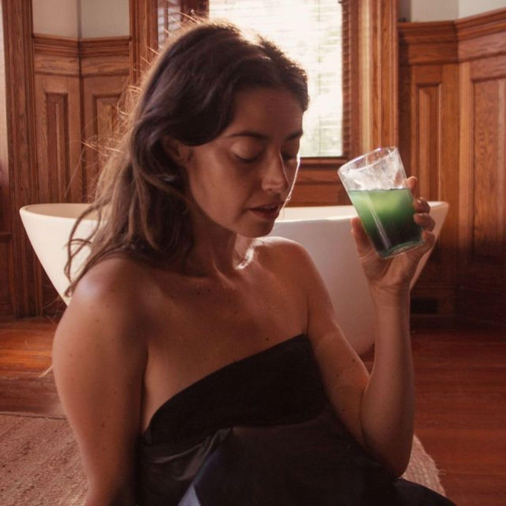 HigherDOSE Detox Drops packaging showcases plant-powered ingredients for skin glow potential