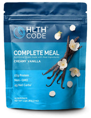 HLTH CODE Complete Meal Replacement shake pours into a glass with creamy vanilla nutrition boost.
