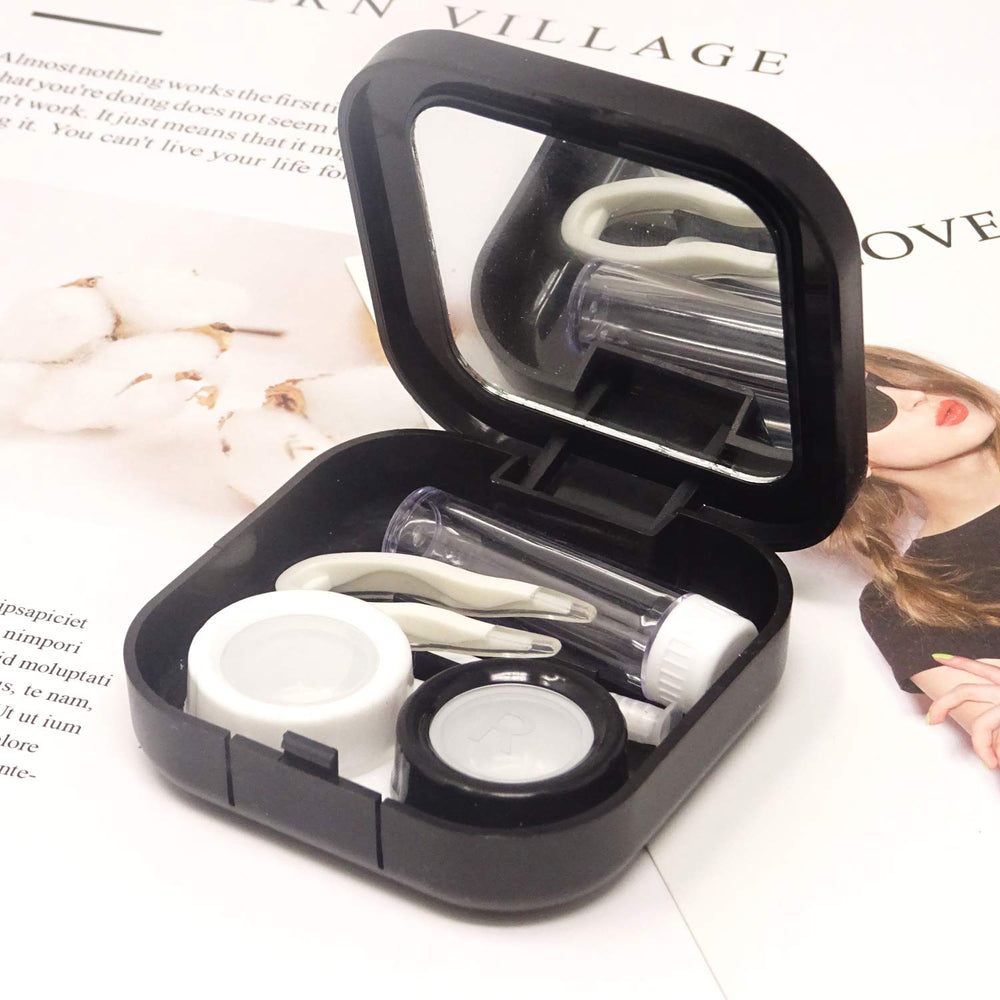 Portable contact lens case kit opened displaying mirror and accessories