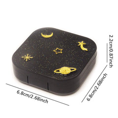 Inside view of lens case with tweezer and applicator