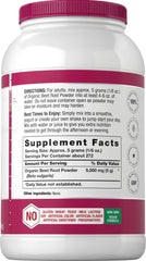 Beet root powder being poured from a scoop.