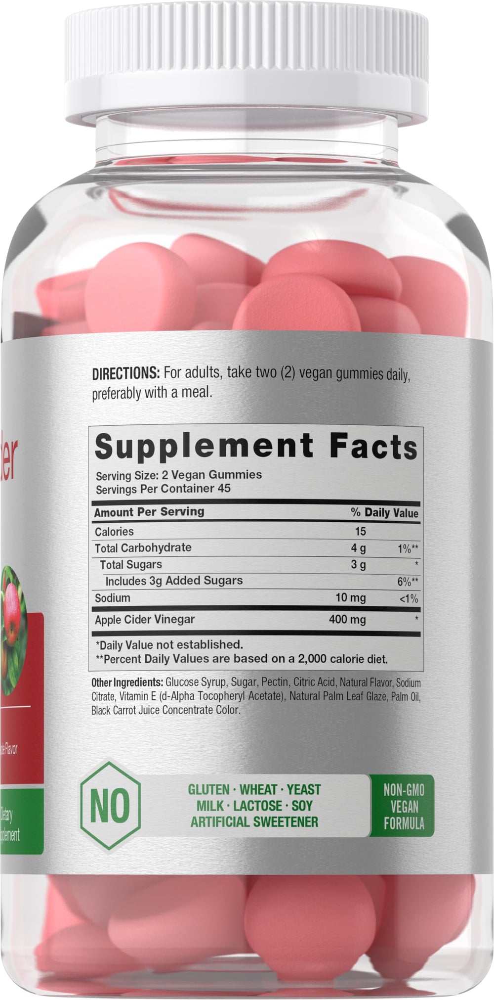 Apple-flavored vegan ACV gummies spilled from bottle