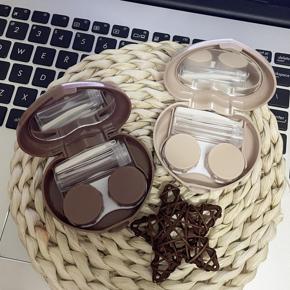 Open lens case showing inner mirror and storage space
