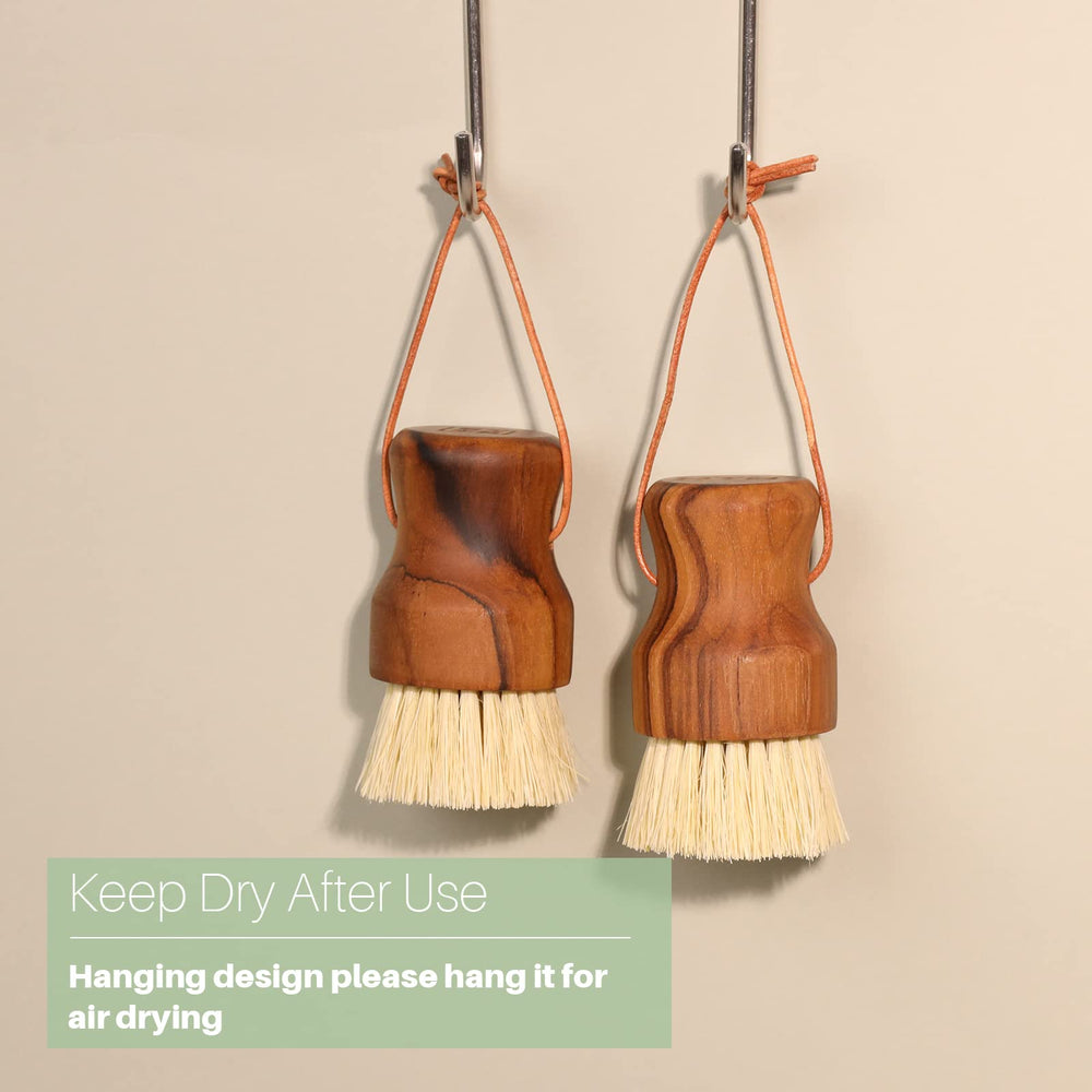 Non-slip base of teak dish scrub brush on counter