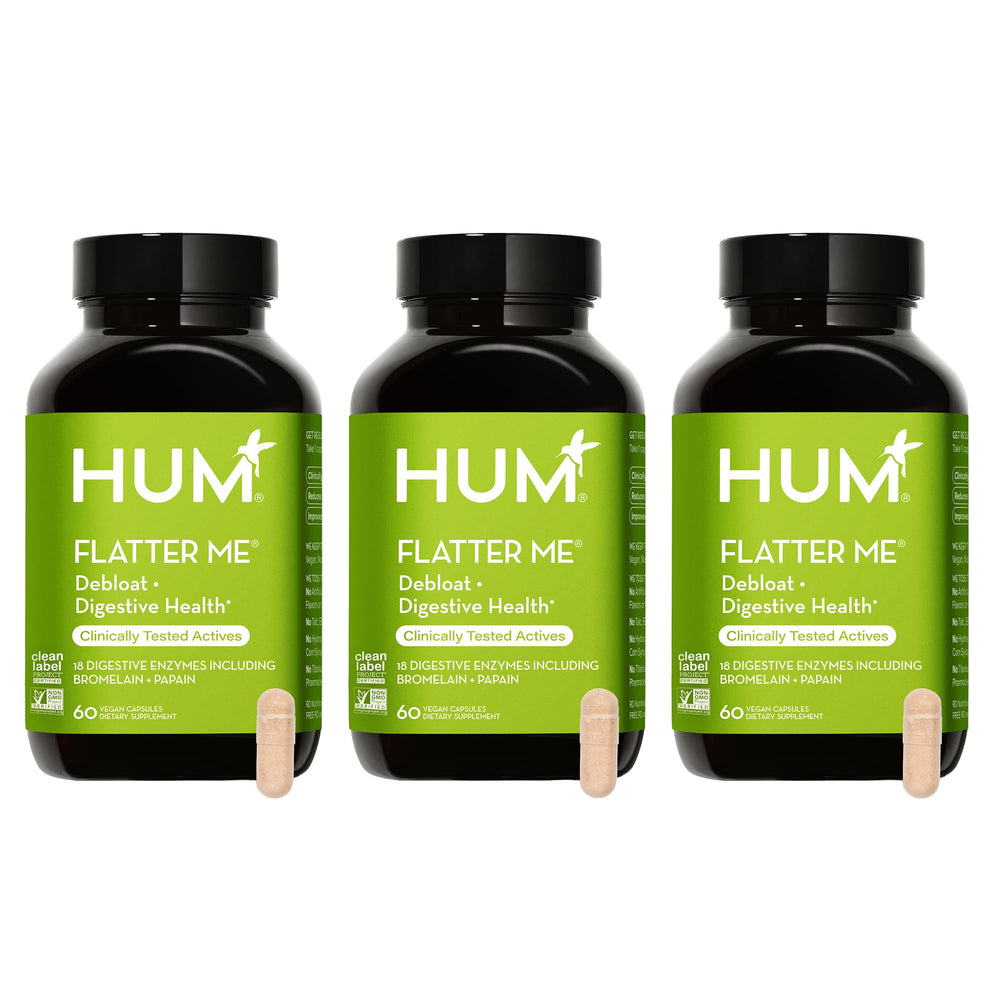 HUM Flatter Me bottle with product label
