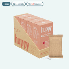 Close-up of HUPPY Strawberry toothpaste tablets in container