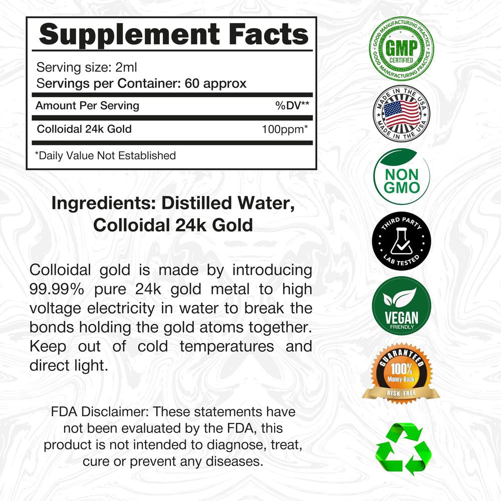 Close-up of ruby red colloidal gold liquid in glass bottle