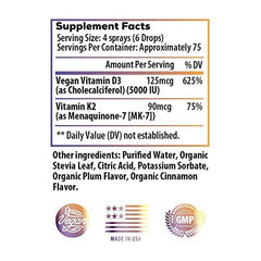 Close-up of the Ideal Infusion D3 + K2 bottle showing Organic Plum Cinnamon flavor