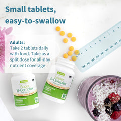 60 small tablets arranged on white background