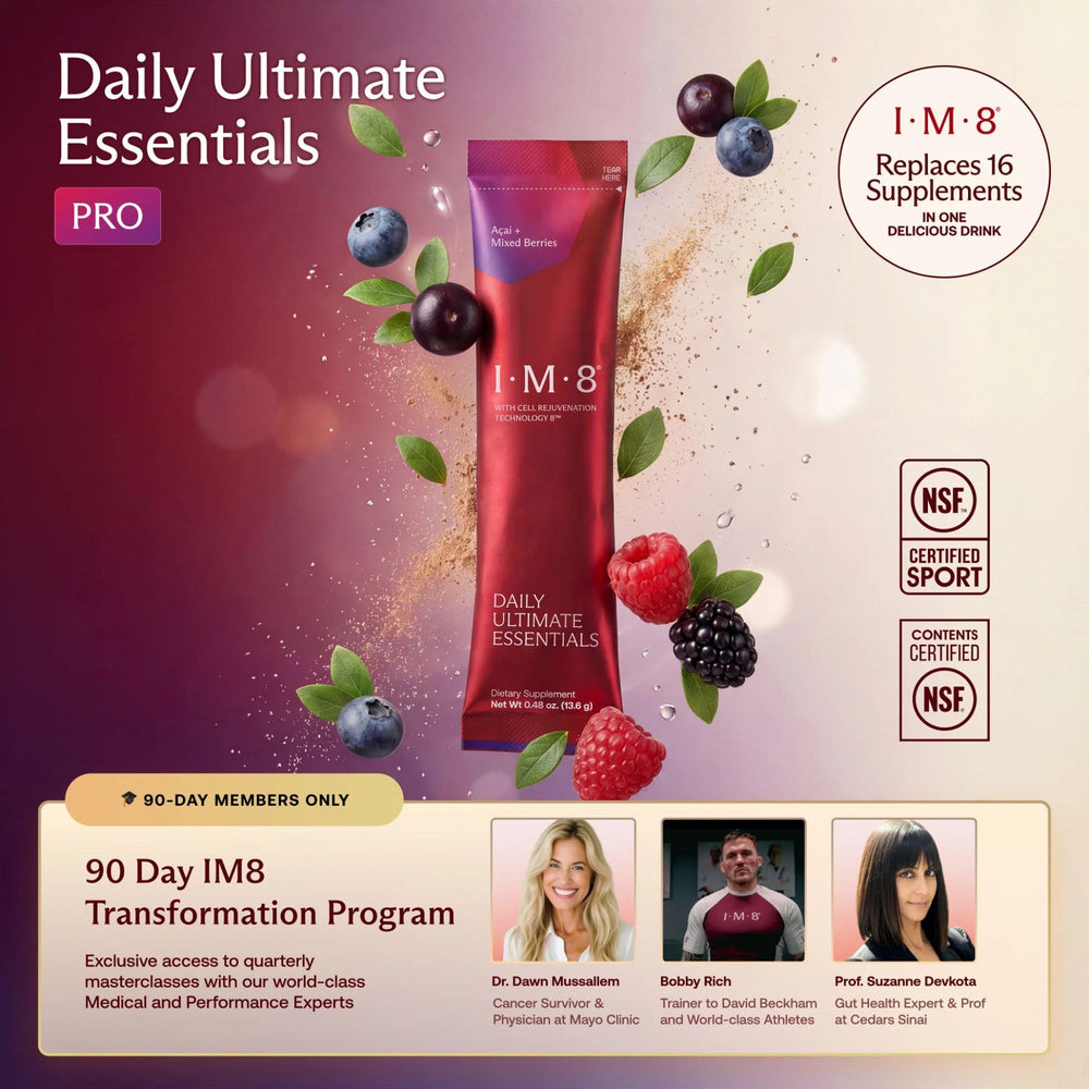 IM8 Daily Ultimate Essentials tub with spoon ready to scoop a balanced daily formula.