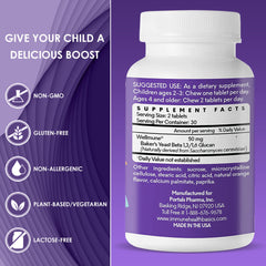Happy child taking an Immune Health Basics chewable tablet