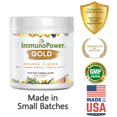 Orange-flavor ImmunoPower Gold powder in glass with liquid