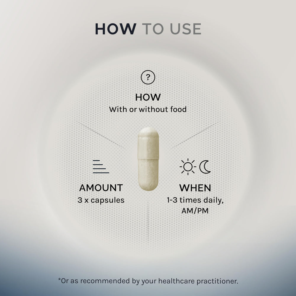 InfiniWell Strength glass with water and capsules ready for daily use.