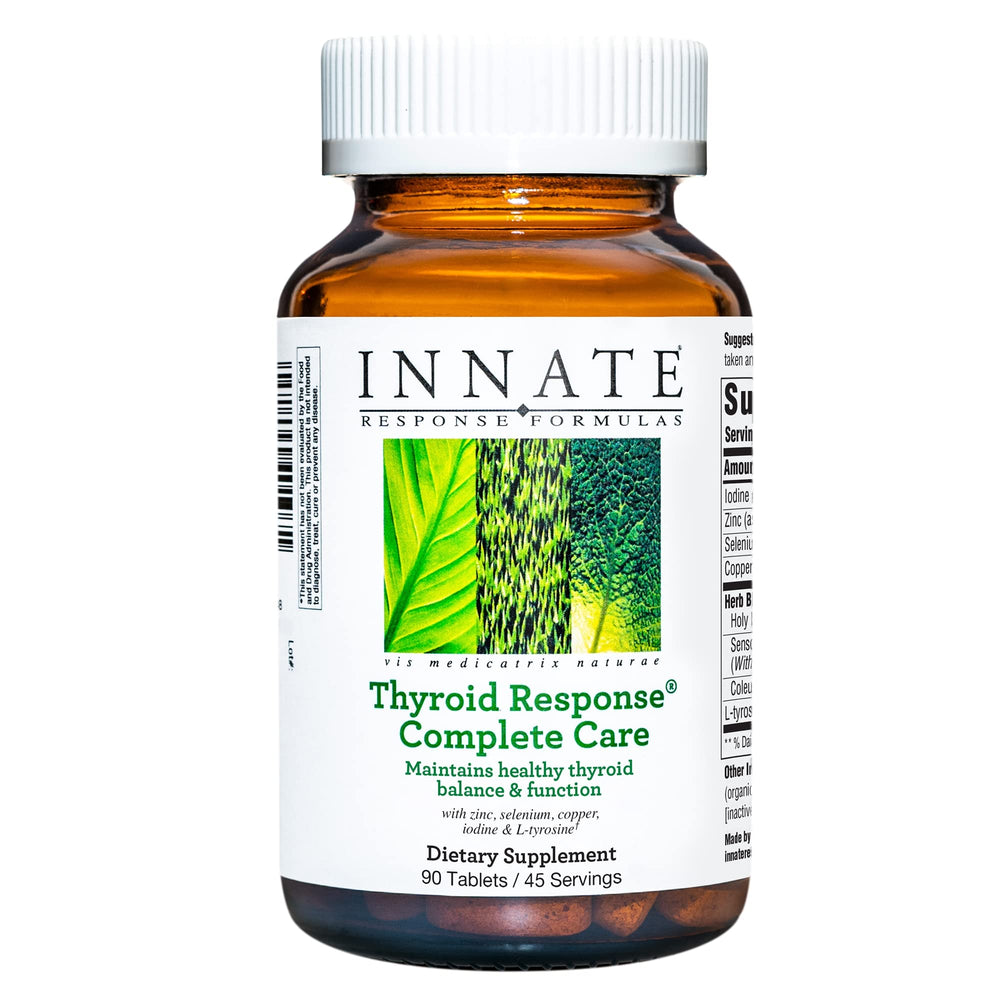 Front view of the Innate Thyroid Response Complete Care bottle with Ashwagandha capsules.