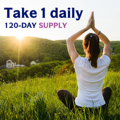 Capsules spilled next to bottle for scale