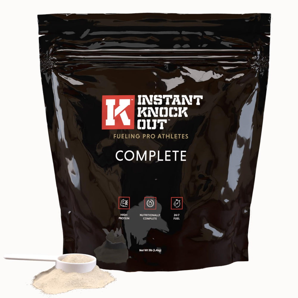 Instant Knockout Complete Shred Vanilla tub with scoop