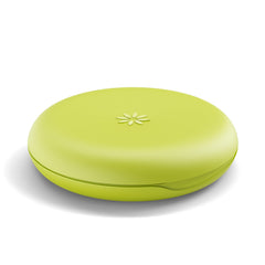 Side view of slim lime green Invisalign case for travel