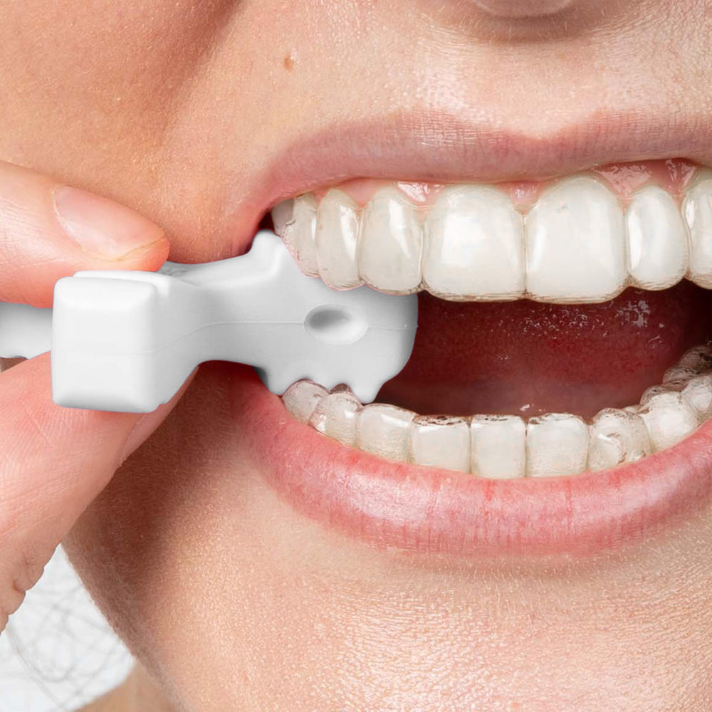 Chewies seated in the mouth to guide aligner fit
