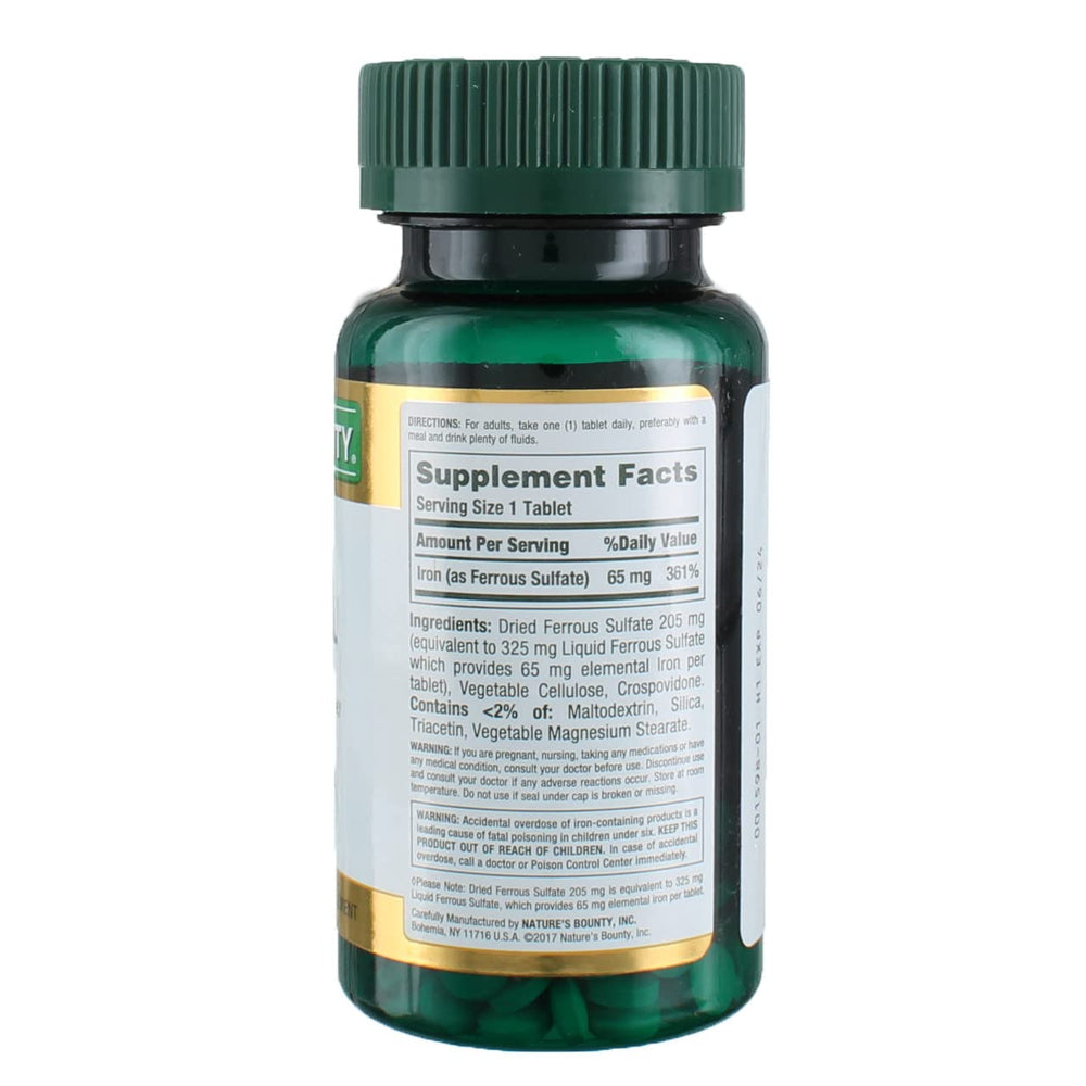 Back label of Iron 65 mg supplement bottle showing dosage