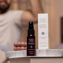 Botanicals such as tart cherry and chamomile depicted near the bottle