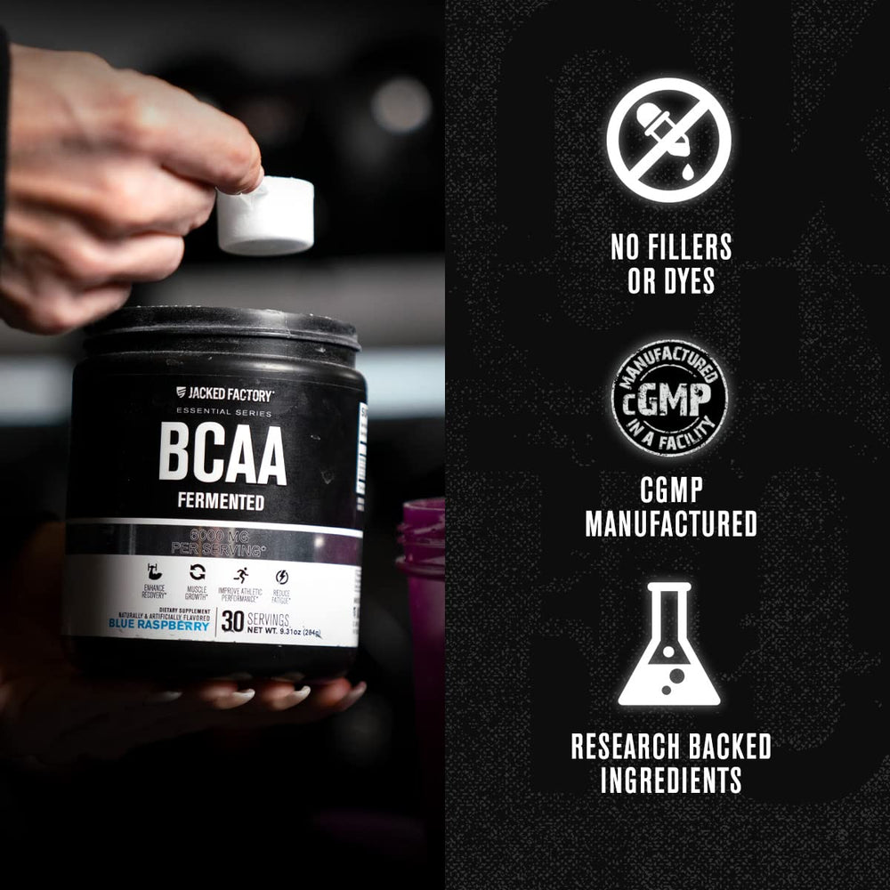 Scoop pouring BCAA powder into a shaker