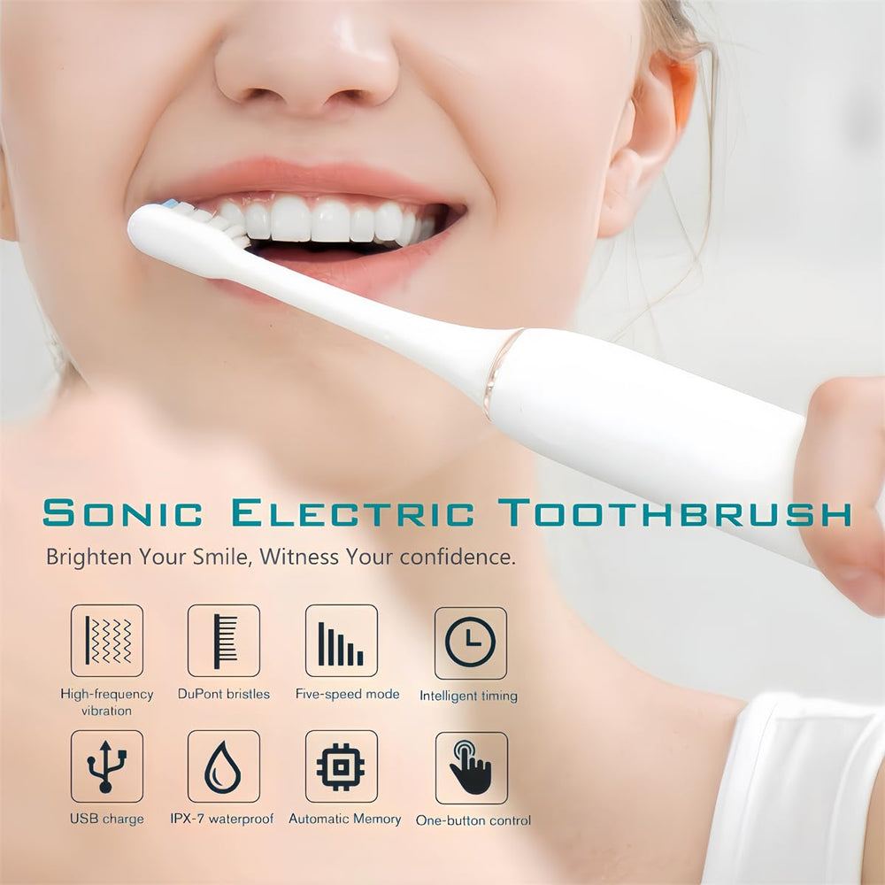 Close-up of JIMBOBO pink toothbrush showing replacement brush heads