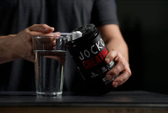 Open 16 oz jar with creatine powder inside
