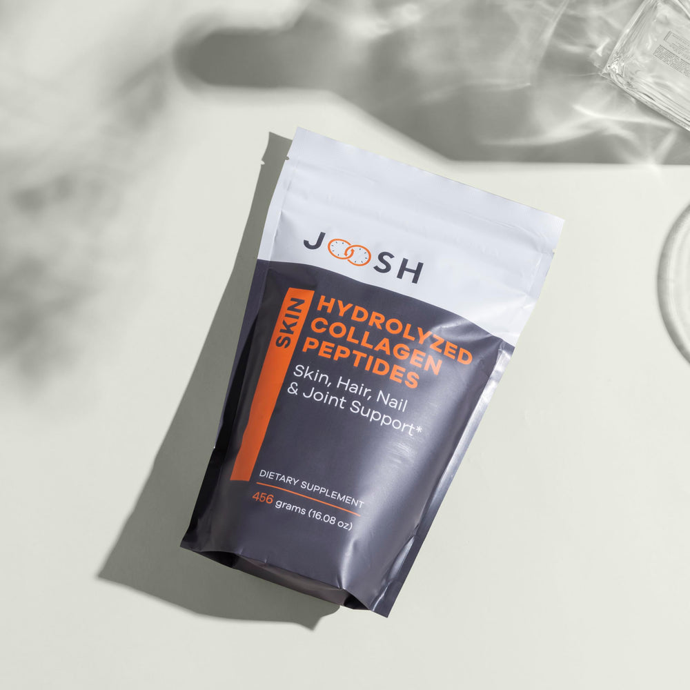 10g collagen serving scoop beside 456g pouch