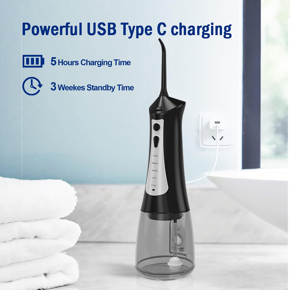 Portable water flosser with USB charging cable for travel
