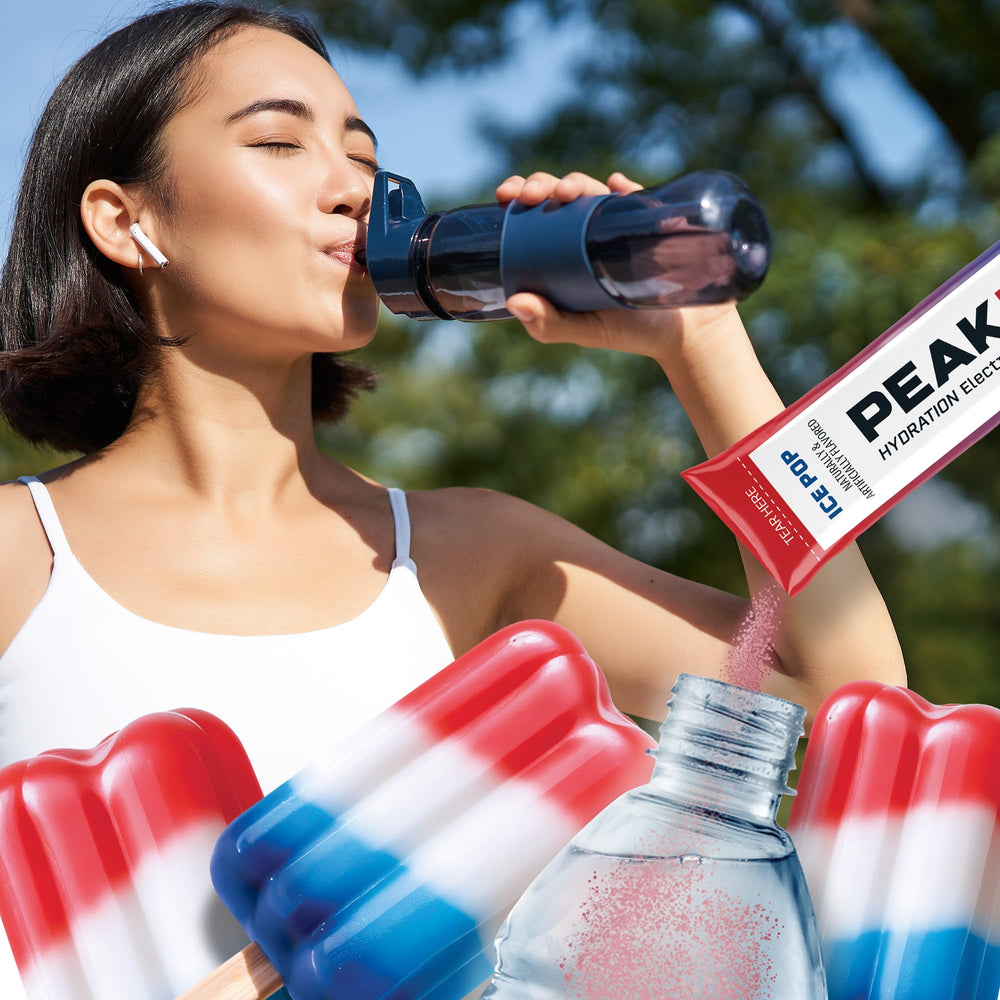 Juicy Mixes PeakH2O being stirred into water for quick hydration on the go.